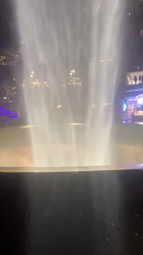 Jewel Changi's Rain Vortex glows under evening light show