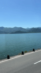 Scenic turquoise lake views documented along Vranjina Montenegro roadway