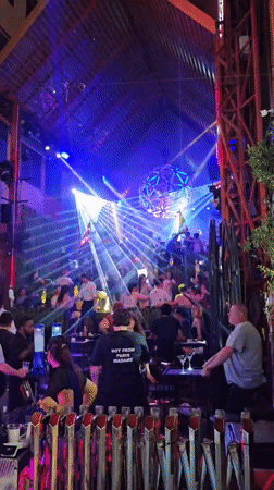 Bangkok nightclub lights up with dancing and an international crowd