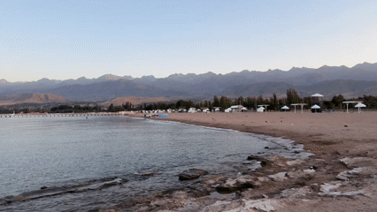Sunset over Lake Issyk-Kul at a Bosteri beach resort