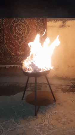 Brazier fire burns indoors in Cairo residence