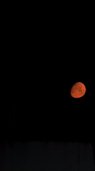 Orange moon observed over Varna, Bulgaria night sky