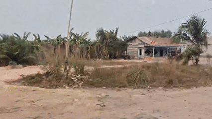 Road-level views of fire damage and village streets in South Sumatra