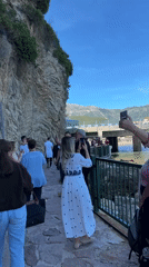 Tourist captures scenic Budva coastline views including Sveti Stefan