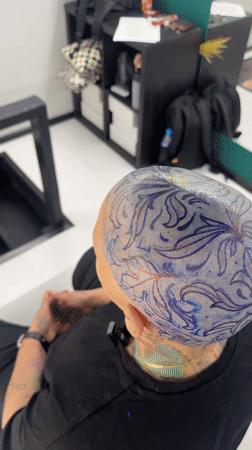 Elaborate floral head tattoo session documented in Sofia