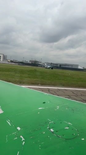 Aircraft taxis on runway at Tashkent airport