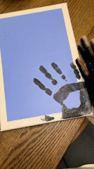 Artist creates handprint canvas painting in Limassol studio session