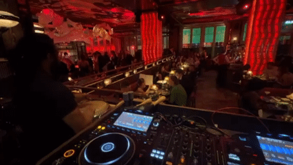 DJ performances enliven upscale London restaurants during evening hours