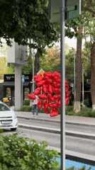Car decorated with red heart balloons spotted in Tashkent