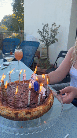 Birthday celebration held on outdoor patio in Rousset, France