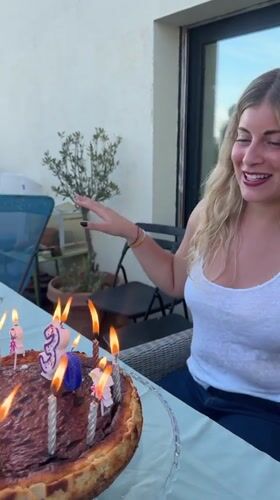 Birthday celebration held on outdoor patio in Rousset, France