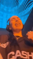 Female DJ performs at Moscow nightclub celebration with crowd participation