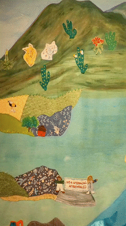 Art exhibition featuring textiles and sculptures documented in Providencia