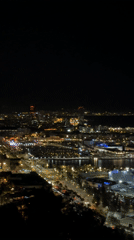 Nighttime harbor panorama captured in Barcelona