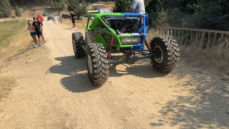 Colorful off-road vehicle draws a crowd on dirt roads in Govedartsi