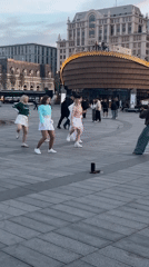 Young women perform synchronized K-pop dance in Moscow plaza