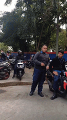 Motorcycle group gathering in a South Jakarta parking lot
