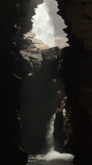 Tourist explores Pokhara caves and Hindu statues during morning visit