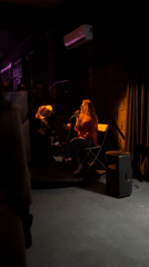 Street performer sings on small stage in Yerevan