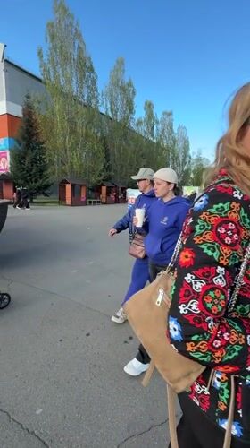 Visitors browse craft market stalls in Abakan, Russia