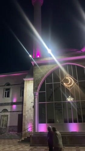 Makhachkala's Great Mosque glows at night amid festive street lights