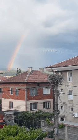 Rainbow appears over Pokrovnik, Bulgaria residential area