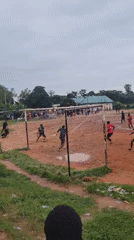 Muddy pickup soccer and street life in Egbagu, Nigeria