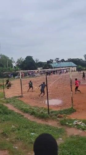 Muddy pickup soccer and street life in Egbagu, Nigeria
