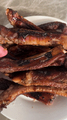 Grilled ribs and duck necks meal documented in Nha Trang