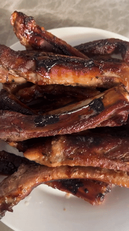 Grilled ribs and duck necks meal documented in Nha Trang