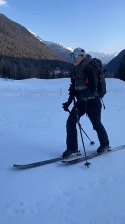 Skiers traverse snowy terrain in Vallorcine, France