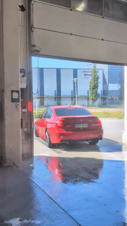 Red car gets thorough wash at Vantaa car facility
