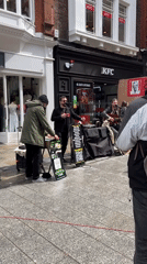 Street musicians draw crowds on Dublin pedestrian streets