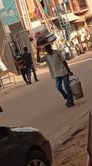 Daily street life documented in Maiburiji, Nigeria commercial district
