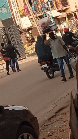 Daily street life documented in Maiburiji, Nigeria commercial district