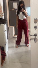 Woman takes mirror selfie in Khimki indoor setting