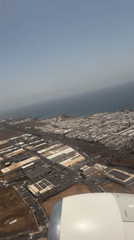 Aerial view captured of coastal San Bartolomé from airplane