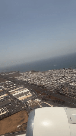 Aerial view captured of coastal San Bartolomé from airplane