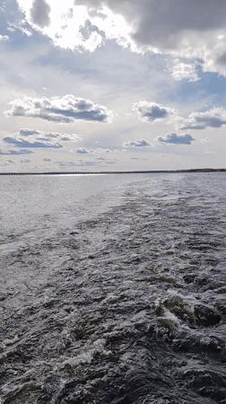 Boat wake captured on Russian lake near Vologda