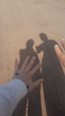 Two people share intimate moments on rural road