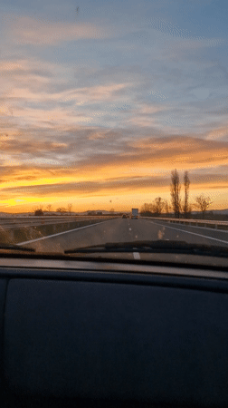 Sunset highway drive recorded near Dobrovnitsa, Bulgaria
