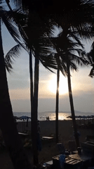 Sunset observed at tropical beach in Pattaya, Thailand