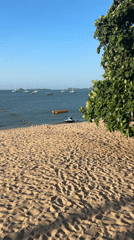 Beach bar setup on Ko Samui with DJ booth and food promos