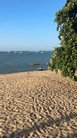 Beach bar setup on Ko Samui with DJ booth and food promos
