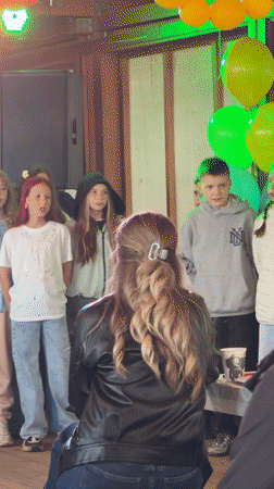 Children's singing performance held in Chaikovsky, Russia school venue
