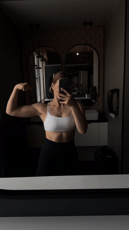 Woman takes fitness selfies in Ternopil bathroom