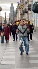 Street performers entertain crowds near historic Saint Petersburg landmarks