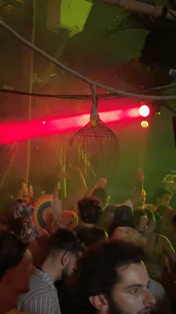 Dance party at thatched roof nightclub in North Kuta