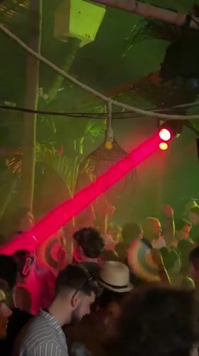 Dance party at thatched roof nightclub in North Kuta