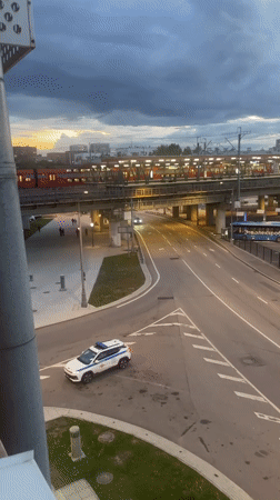 Police car stationed at Moscow intersection